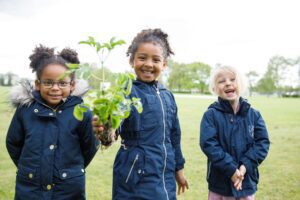 Nursery School Girls with Plant||Lady Business School Wellingborough|