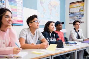 Children in classroom at Bosworth College- university