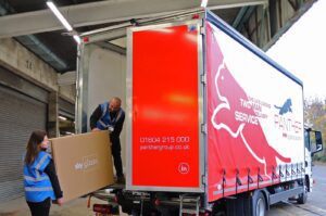 People loading a lorry