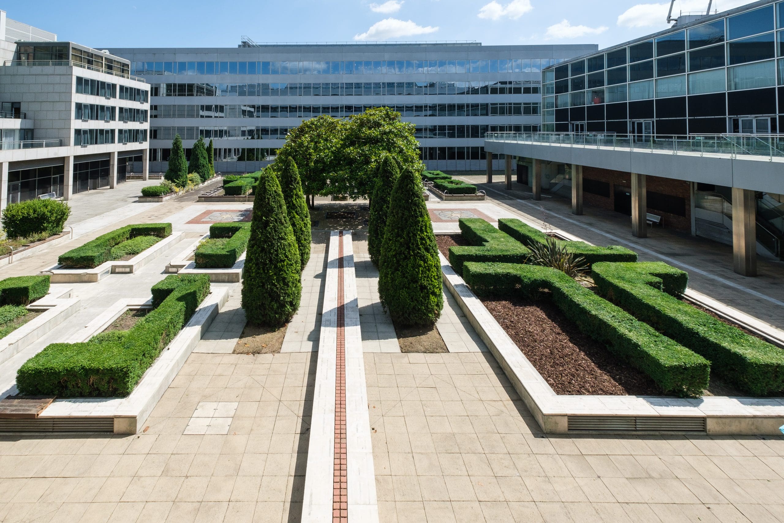 new building offices workspace MK outside|cafeteria offi|cafeteria offices people social lunch break outside