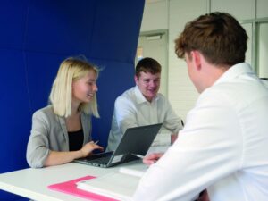 Learning new ways to get the best out of students and colleagues|Student working on her laptop in class